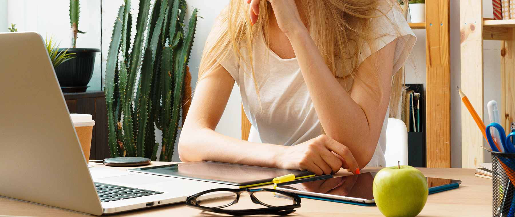 Young woman and tablet working at home office.